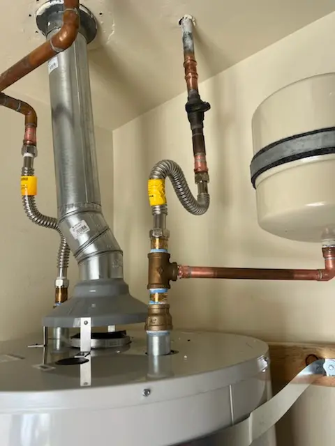 Water heater installation and plumbing repair in London Terrace